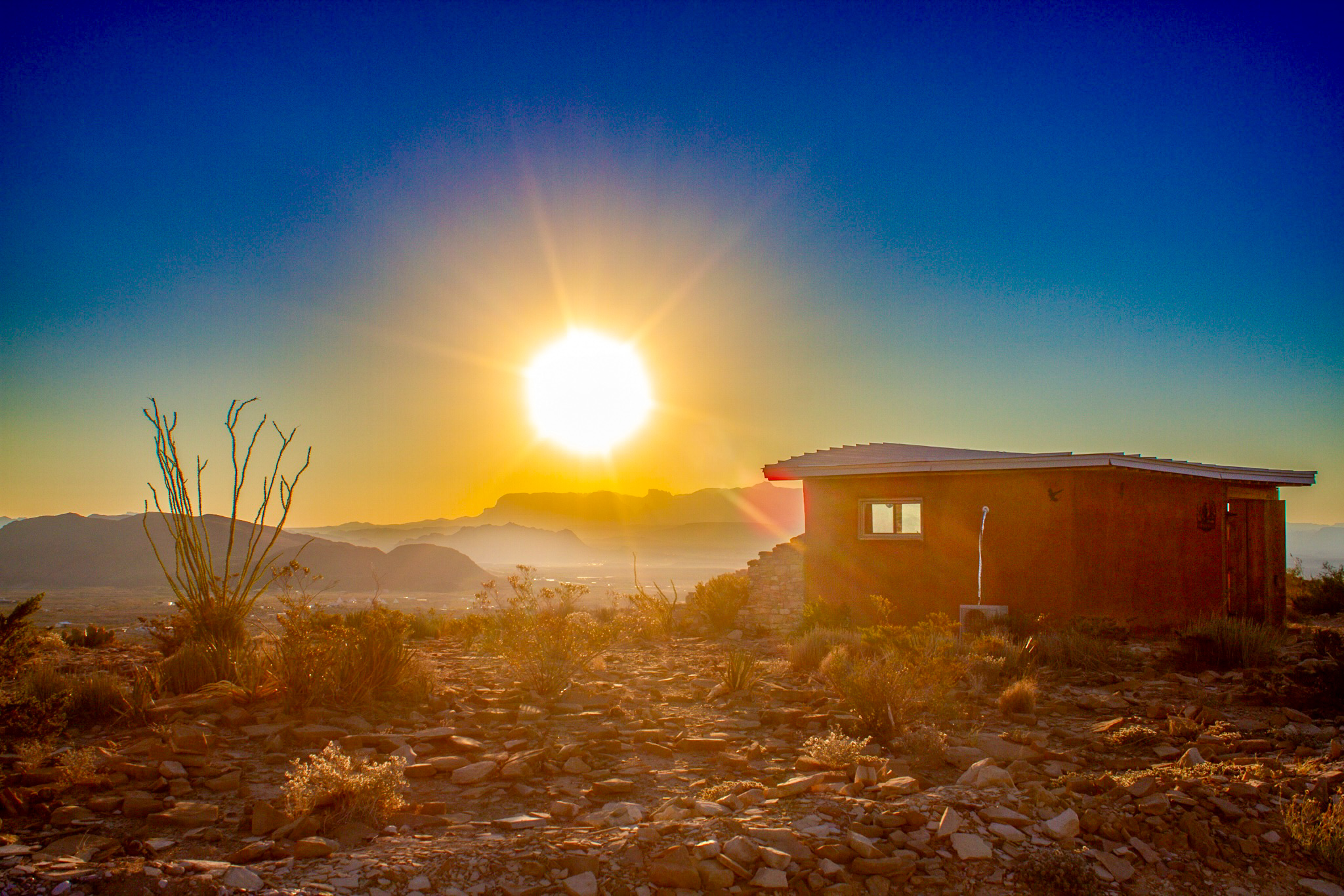 A high ridge overlooking a desert valley